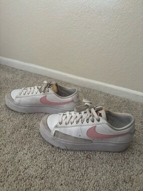 Nike Women’s White Sneakers with Pink Swoosh